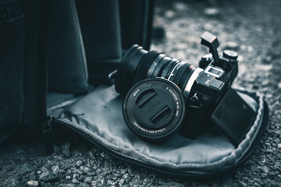 Camera equipment in a bag representing business growth funding